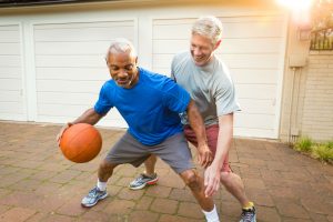 More Metastatic Prostate Cancers Found After Change In Screening Guidelines photo of middle-age men playing basketball
