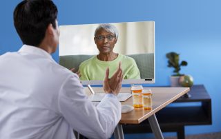 Pharmacist on a telehealth call with female patient