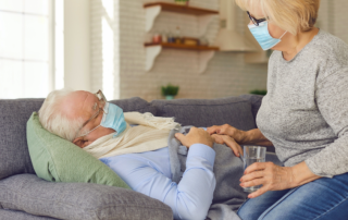 photo of elderly male covid patient and wife