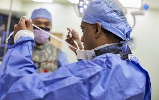 Doctors prepping for Interventional Radiology