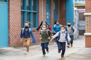 School Kids Running in Masks