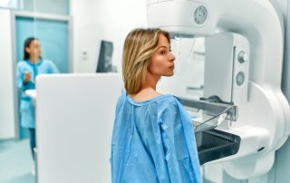 Woman getting mammogram