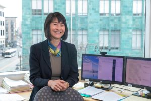 Dr. Lieu at her desk in the previous DOR headquarters in Oakland.